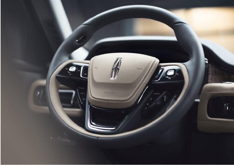 The intuitively placed controls of the steering wheel on a 2023 Lincoln Aviator® SUV | Bill Knight Lincoln in Tulsa OK