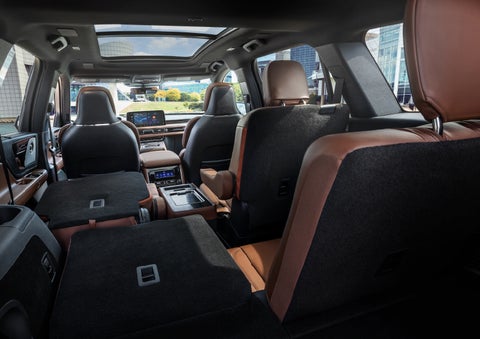 The interior of the 2025 Lincoln Aviator® SUV is shown with two seats folded down for added space. | Bill Knight Lincoln in Tulsa OK