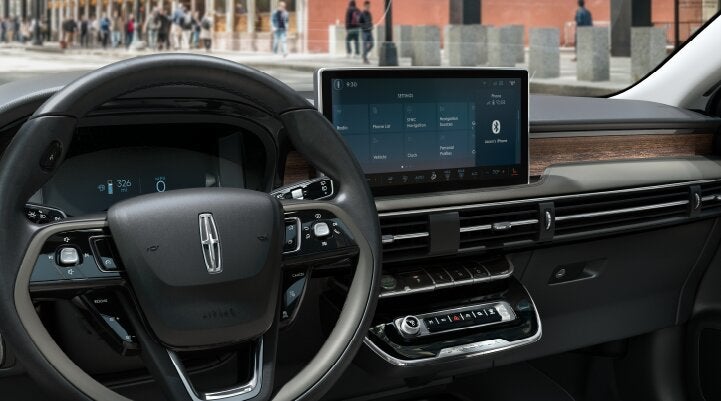 The center screen of the new 2025 Lincoln Corsair® SUV is showcased with its SYNC® 4 capabilities highlighted | Bill Knight Lincoln in Tulsa OK
