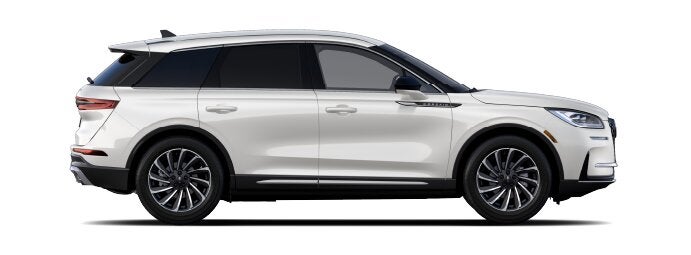 The passenger side of a Lincoln Corsair® SUV is shown in the Ceramic Pearl extra-cost exterior paint option. | Bill Knight Lincoln in Tulsa OK