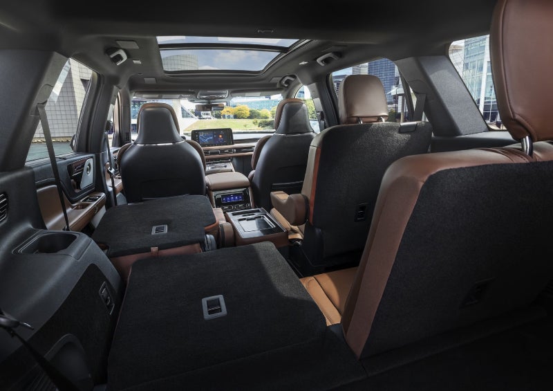One side of the PowerFold® third-row seat and a second-row seat are folded forward in the 2026 Lincoln Aviator® SUV. | Bill Knight Lincoln in Tulsa OK