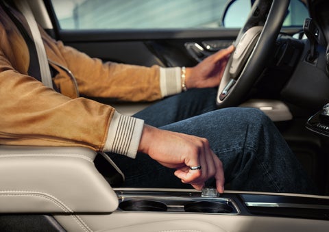 The driver of a 2026 Lincoln Corsair® SUV is shown selecting a drive mode. | Bill Knight Lincoln in Tulsa OK