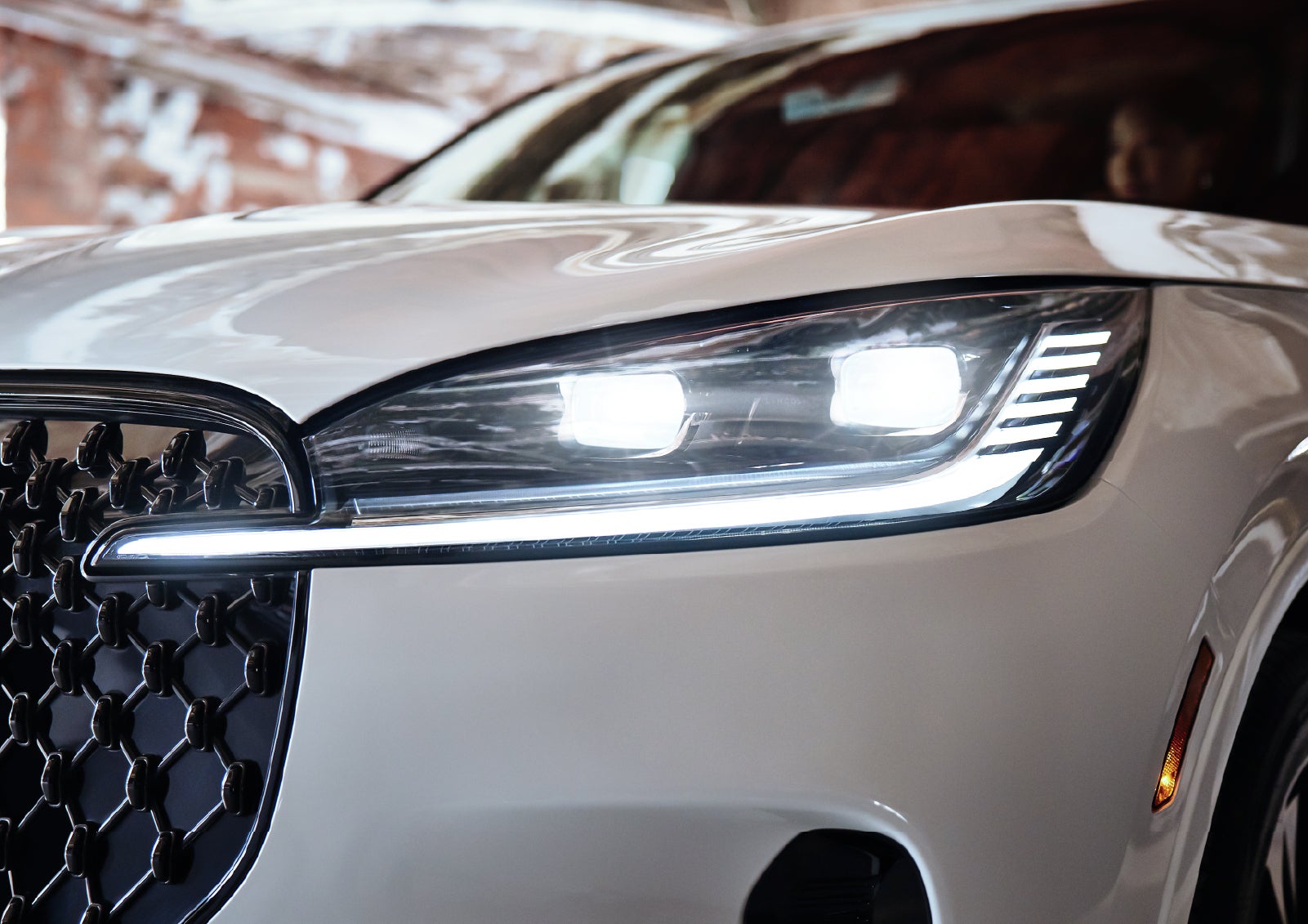 A close-up of a headlamp on the 2027 Lincoln Aviator® SUV is shown. | Bill Knight Lincoln in Tulsa OK