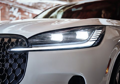 A close-up of a headlamp on the 2027 Lincoln Aviator® SUV is shown. | Bill Knight Lincoln in Tulsa OK