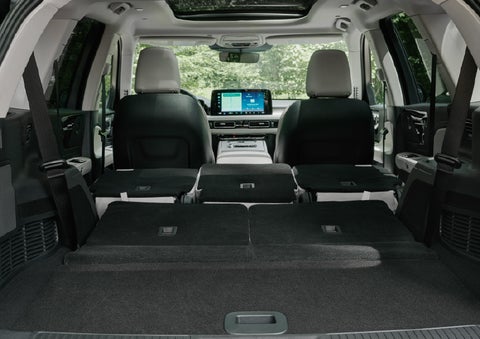 A rear to front view of the interior of a 2027 Lincoln Aviator® Black Label™ SUV shows the third and second rows folded flat | Bill Knight Lincoln in Tulsa OK
